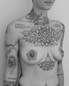Handpoke mandala tattoos on nipples by Dot by Dot in Berlin
